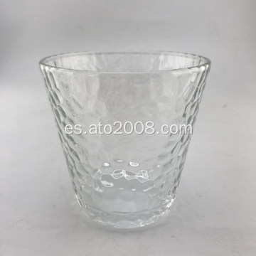 Vaso de vidrio transparente con patrón de daño